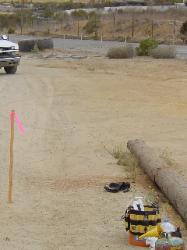 Staging lanes fence goes--Entrance logs cut up